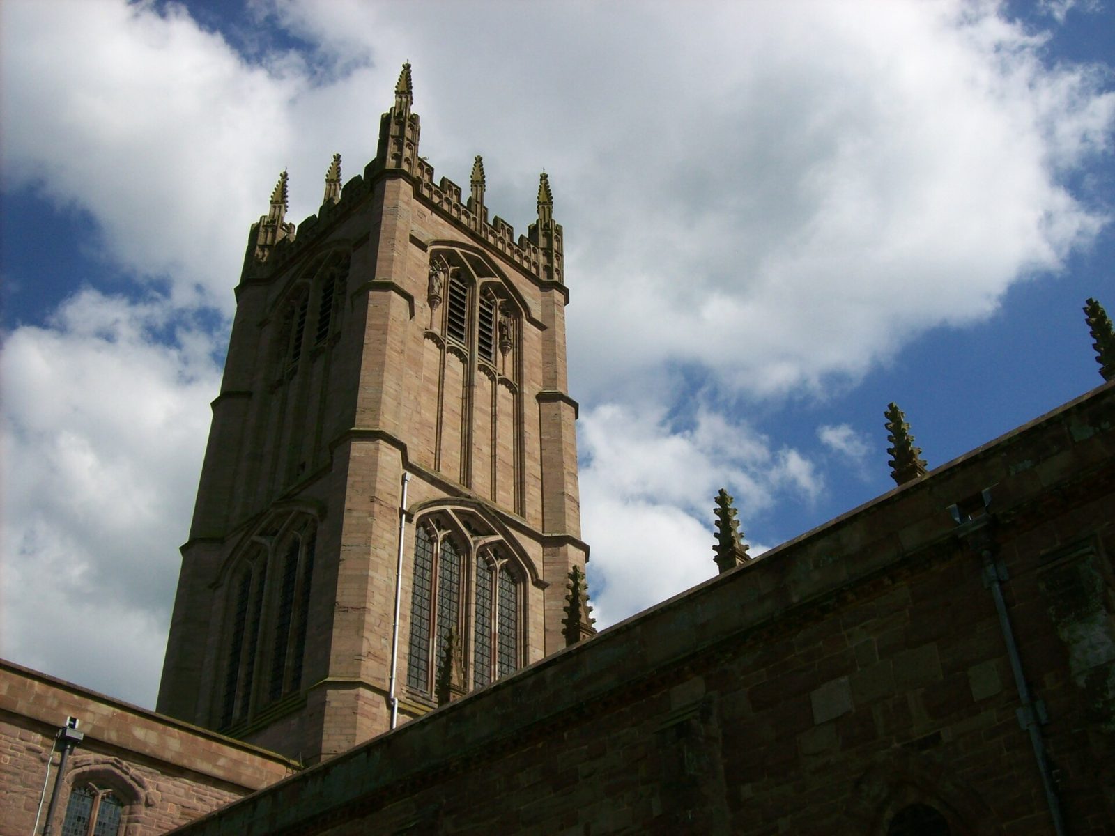 The Perpendicular tower of St Laurence's Church in Ludlow with its corner pinnacles
