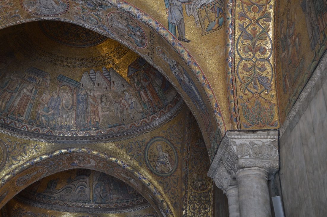 Mosaic figures on a gold ground on the arches of St Mark's Basilica