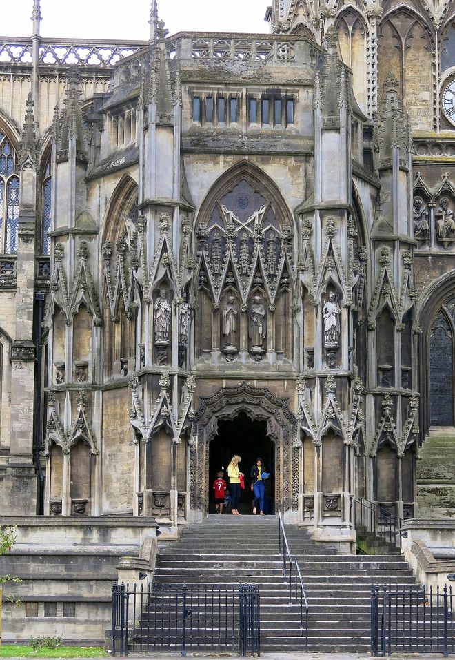 The richly carved outer north porch of St Mary Redcliffe at the top of a flight of steps