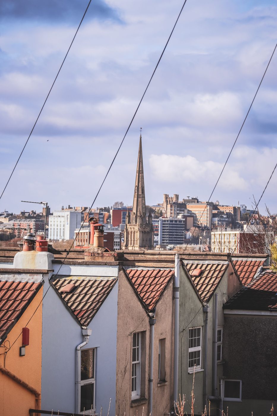 The spire of St Mary Redcliffe rising over the rooftops of Bristol