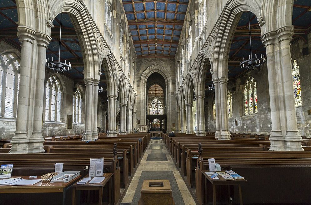 The nave of St Mary's Church, Beverley, looking east between tall arcades towards the chancel