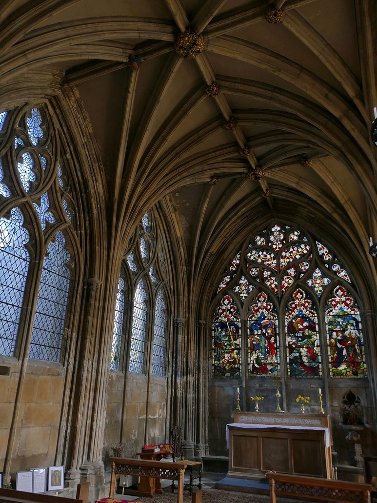 The vaulted St Michael's Chapel at St Mary's, Beverley, with tall windows and a stained glass east window