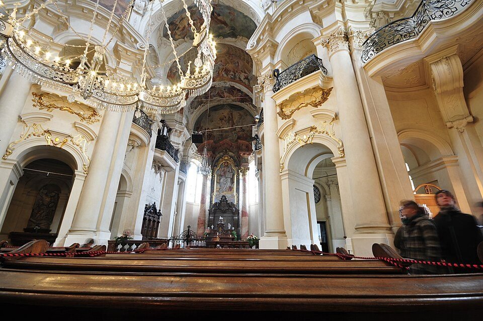 The nave and gallery inside St Nicholas Church, Old Town Square, Prague