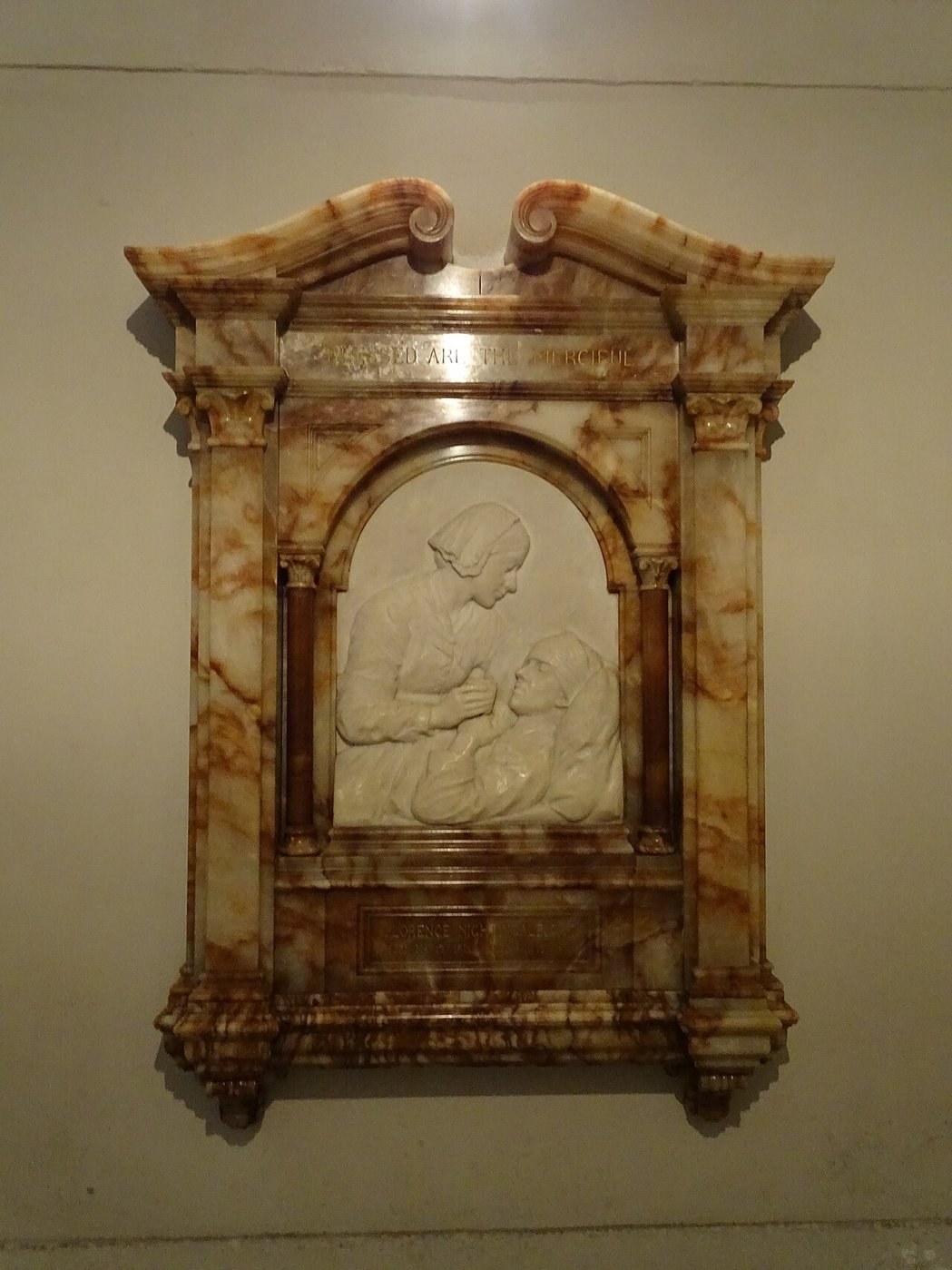 A carved memorial relief in the crypt of St Paul's Cathedral