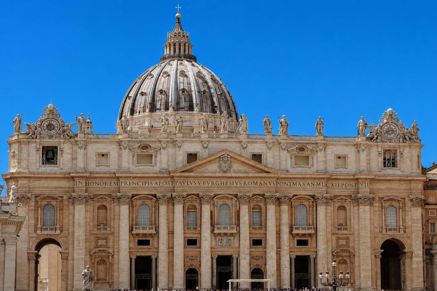 The facade of St Peter's Basilica in Vatican City, with its dome and colonnade