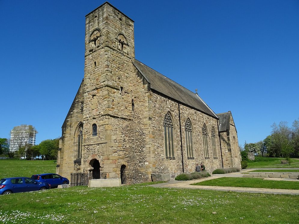 St Peter's Church, Monkwearmouth, seen from the north-west, its tall Anglo-Saxon tower against a blue sky
