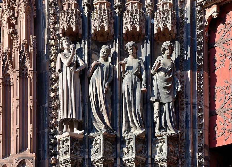 Statues of the Tempter and the Foolish Virgins on the right-hand west portal of Strasbourg Cathedral