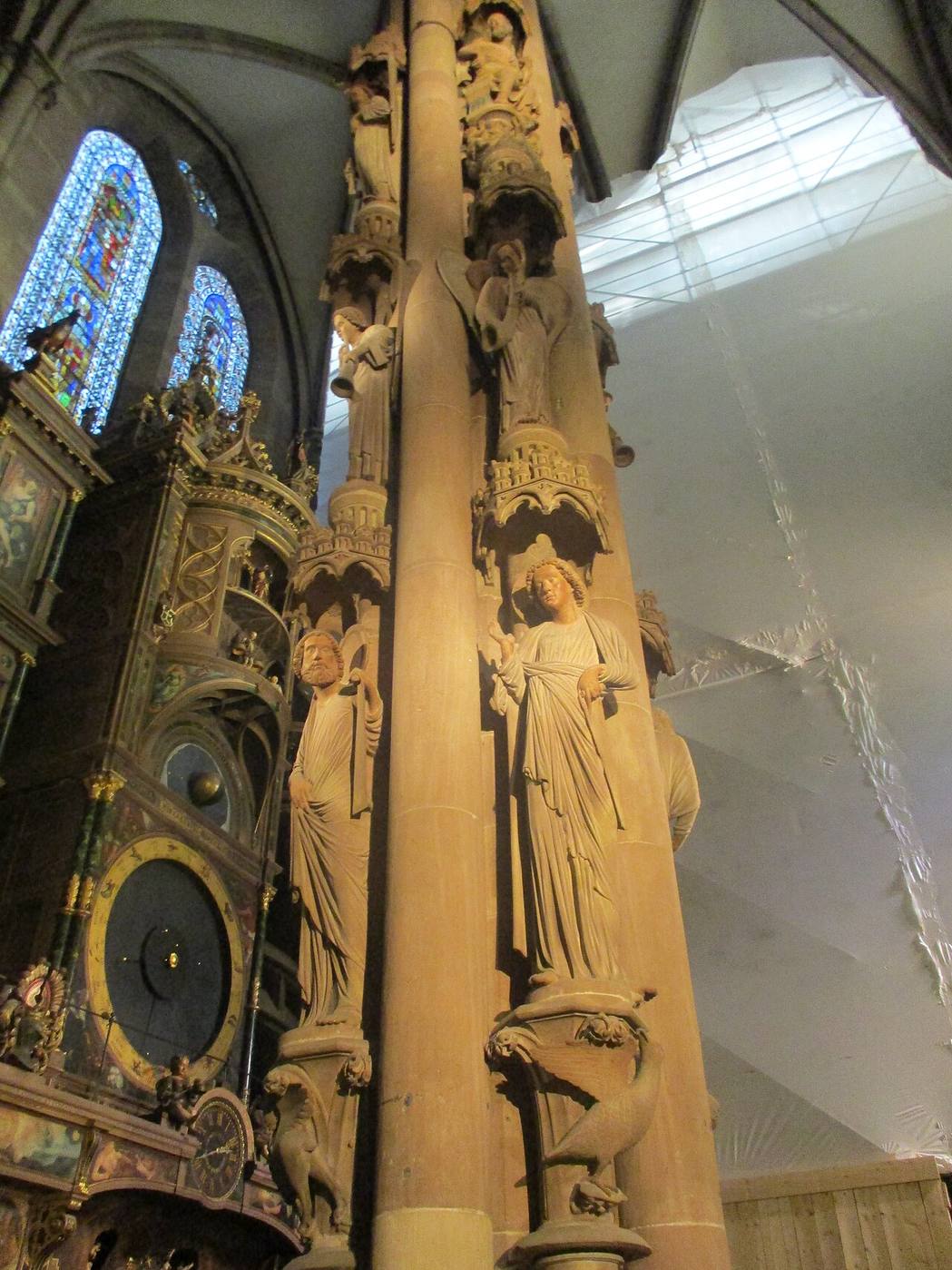 The Pillar of Angels in the south transept of Strasbourg Cathedral with carved figures on three tiers