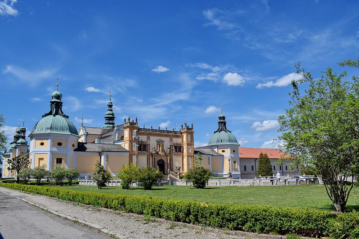 The Baroque pilgrimage complex of Svatá Hora above Příbram, with domed corner chapels and the basilica behind