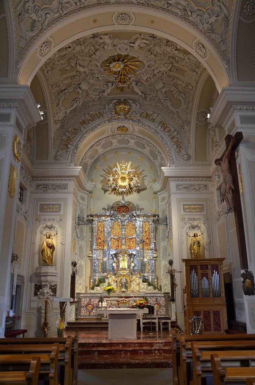 The silver high altar of the Svatá Hora basilica with the small statue of the Virgin at its centre