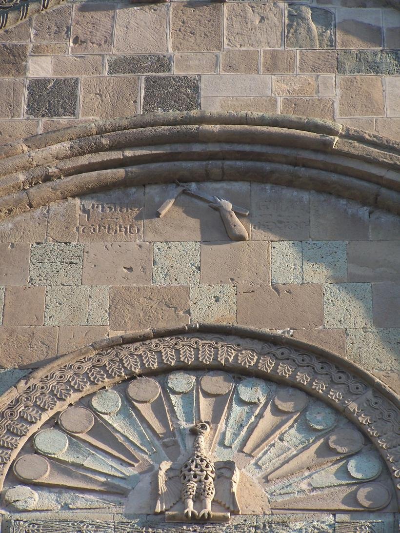 The relief of a hand holding a set square on the north wall of Svetitskhoveli