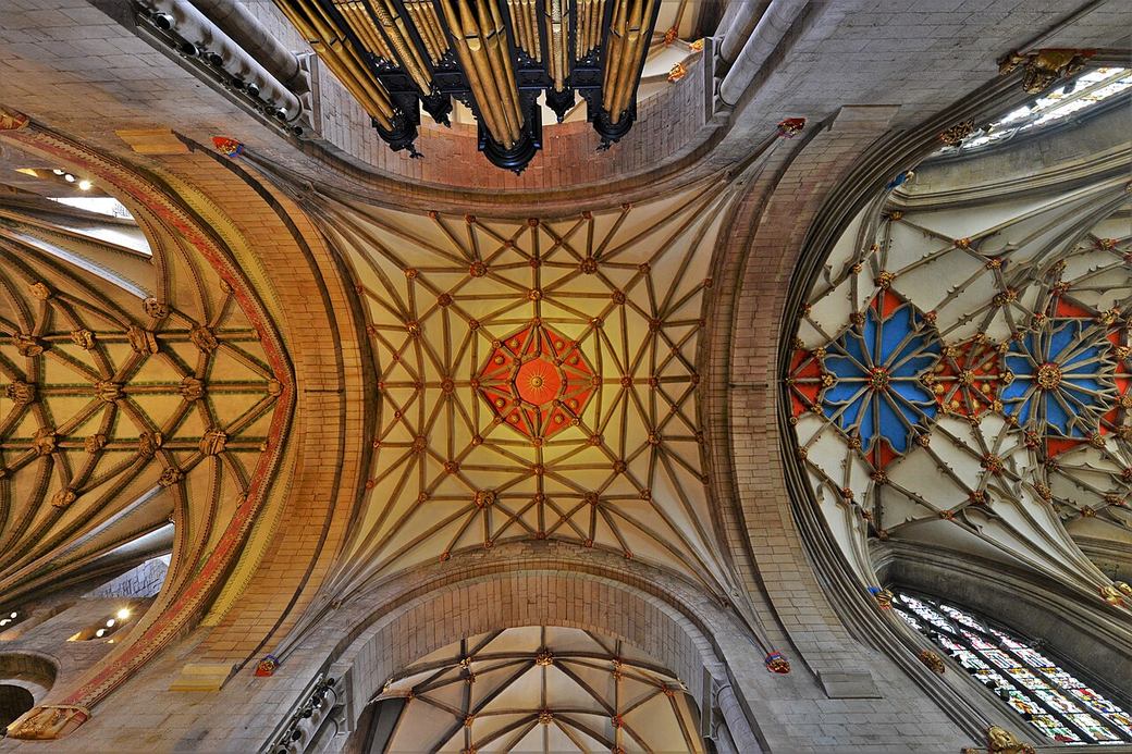Looking up at the painted vaults of the crossing and presbytery at Tewkesbury Abbey