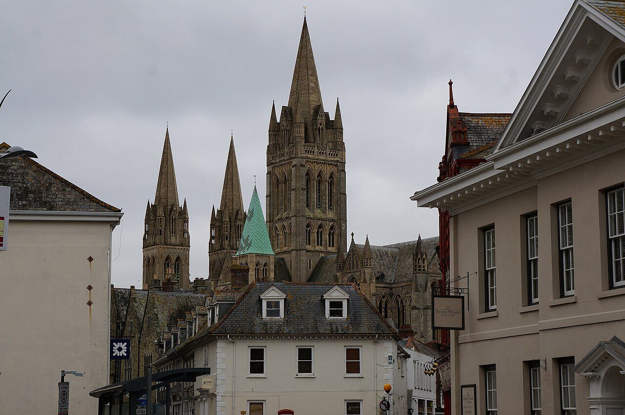 The three spires of Truro Cathedral rising above the rooftops of Truro
