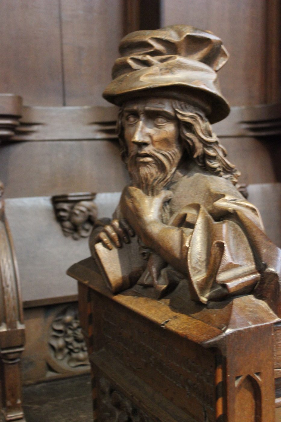 A carved wooden bust of the Roman orator Cicero on the choir stalls of Ulm Minster