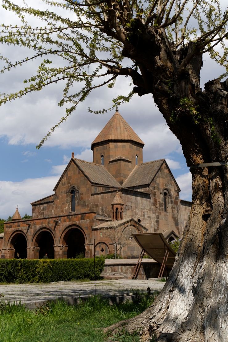 St Gayane Church in Vagharshapat, Armenia, beside a weathered tree