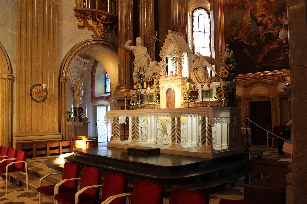 The white marble high altar of the Velehrad basilica with reliefs of Cyril and Methodius