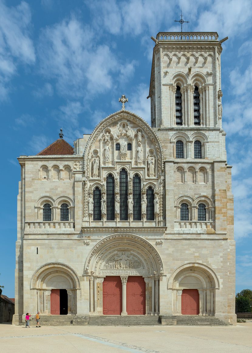 The west front of the basilica of Vézelay, with three portals, a large Gothic window and a single tower