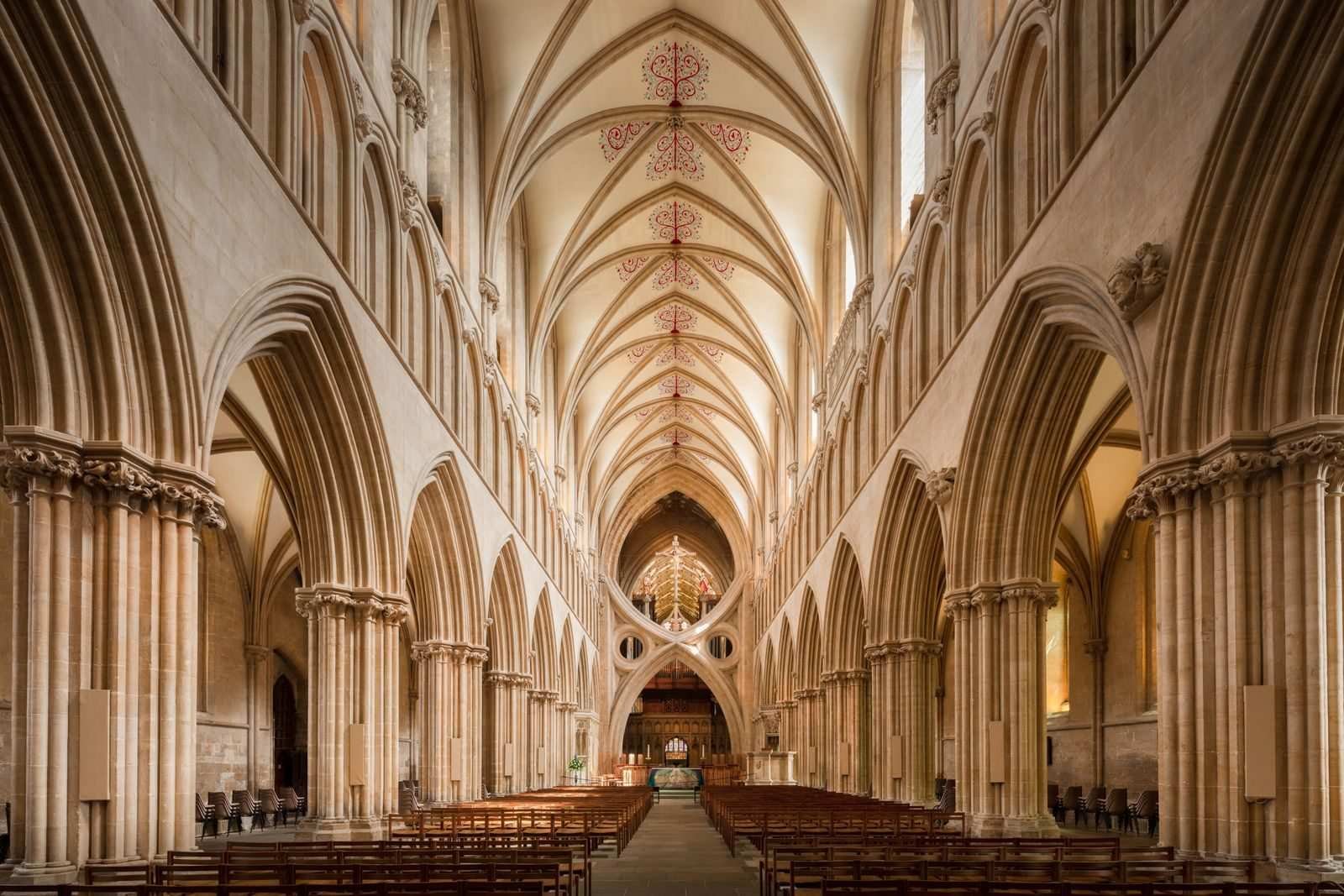 The Gothic nave of Wells Cathedral, its famous scissor arches at the crossing