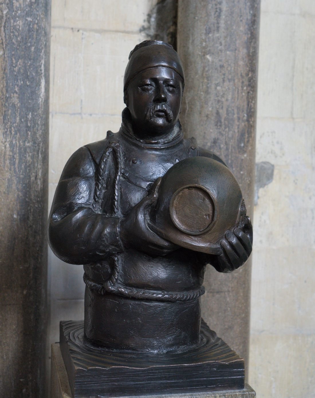 The memorial statue to the diver William Walker in Winchester Cathedral