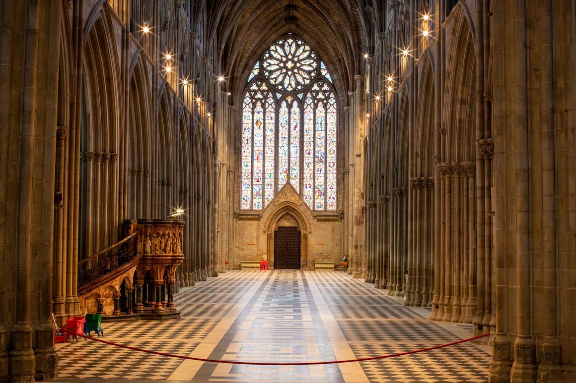 The nave of Worcester Cathedral looking west to the great west window