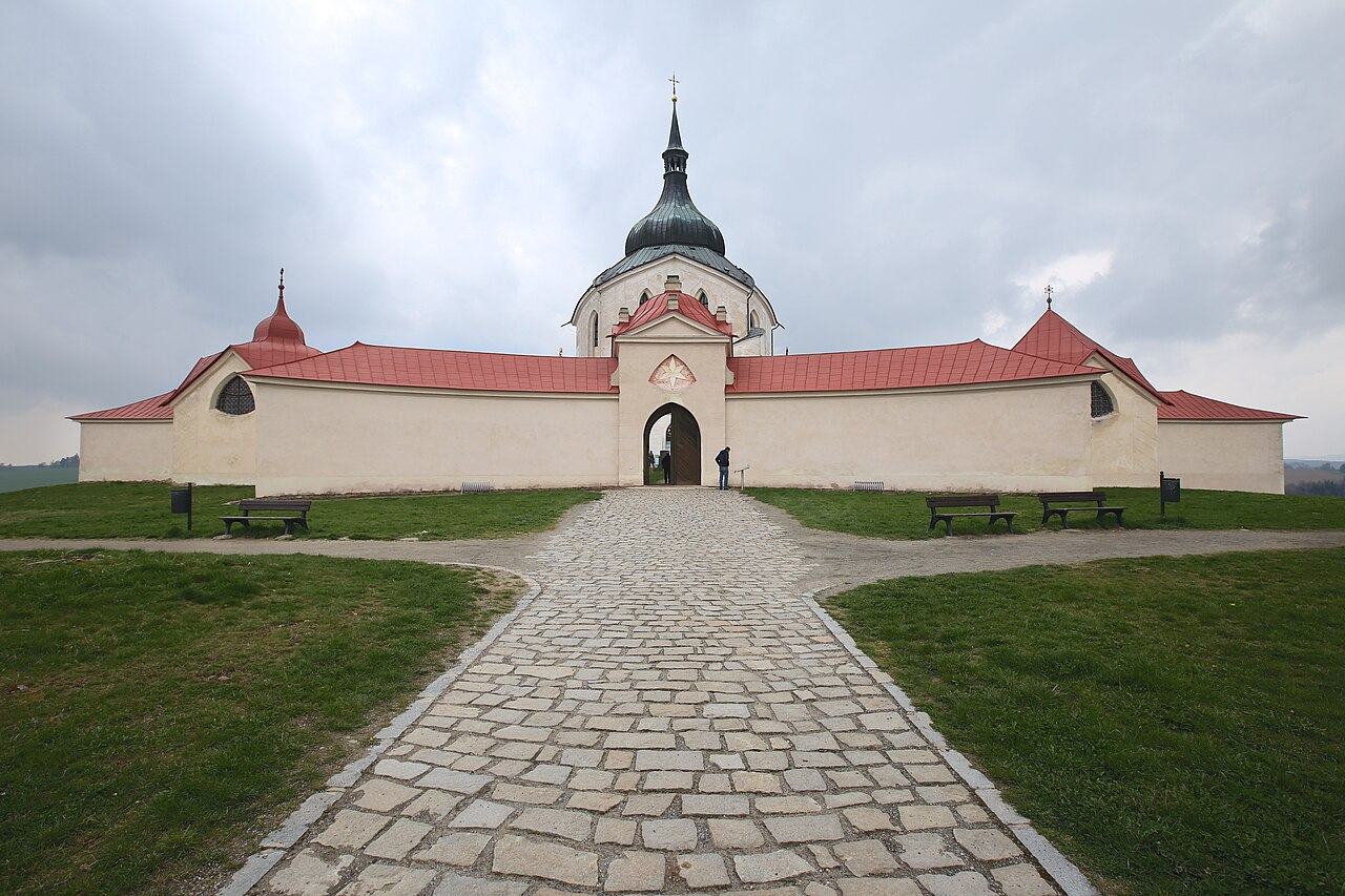 A cobbled path leading to the gate of the cloister around the Zelená Hora church