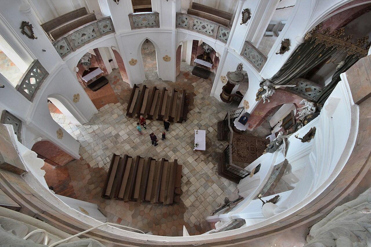 Looking down from the upper gallery into the round interior of the Zelená Hora church